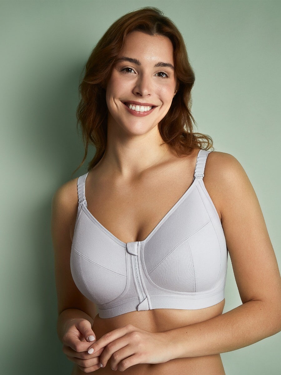 a close up of a front fastening bra showing the popper undone.